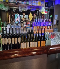 Game day at Time Out Sports Bar Presque Isle Maine — watch NFL, NHL, NBA and all sports on our 9-foot projection screen and HD TVs